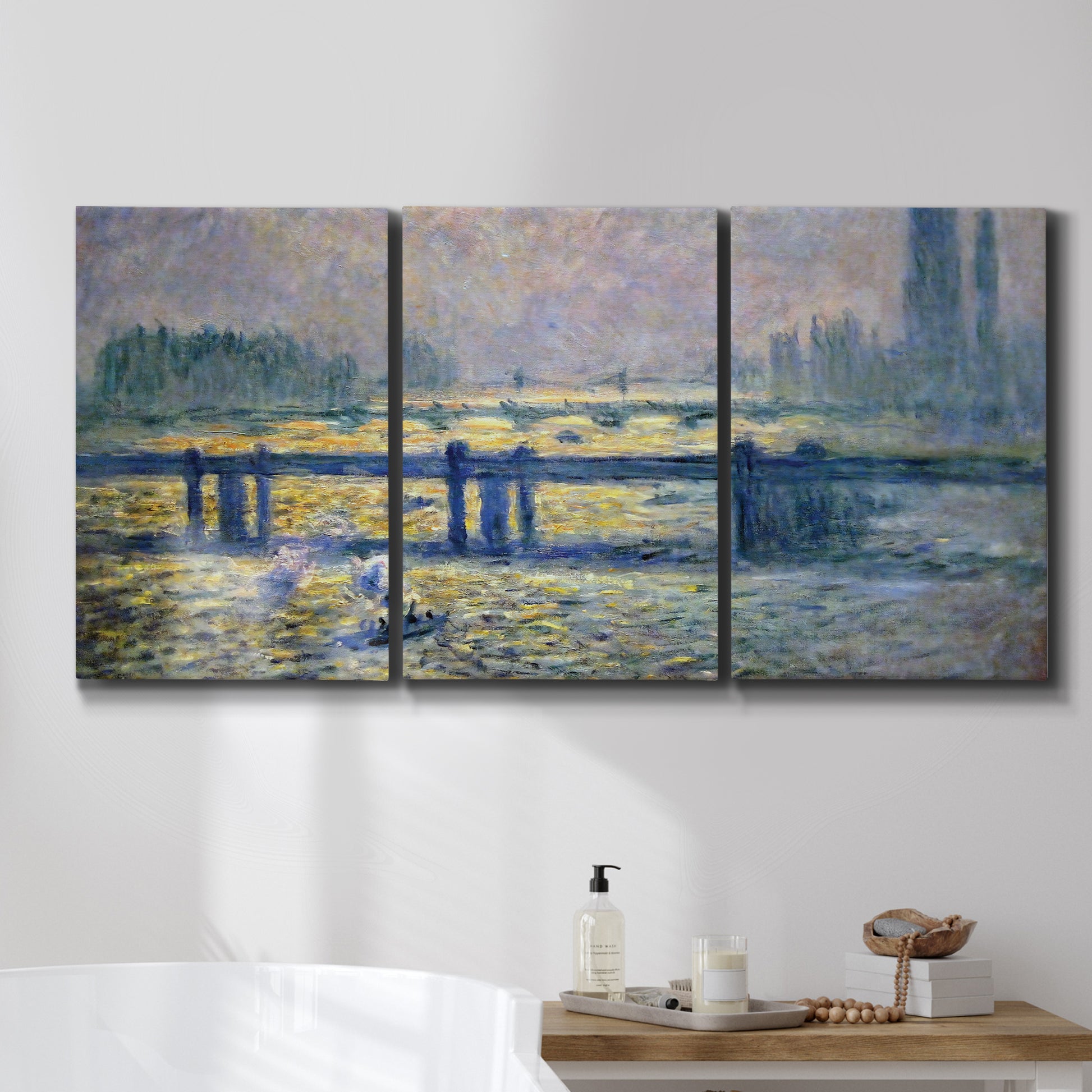 Three-panel canvas wall art featuring london bridge crossing wide river, displayed in a bathroom above a bathtub.