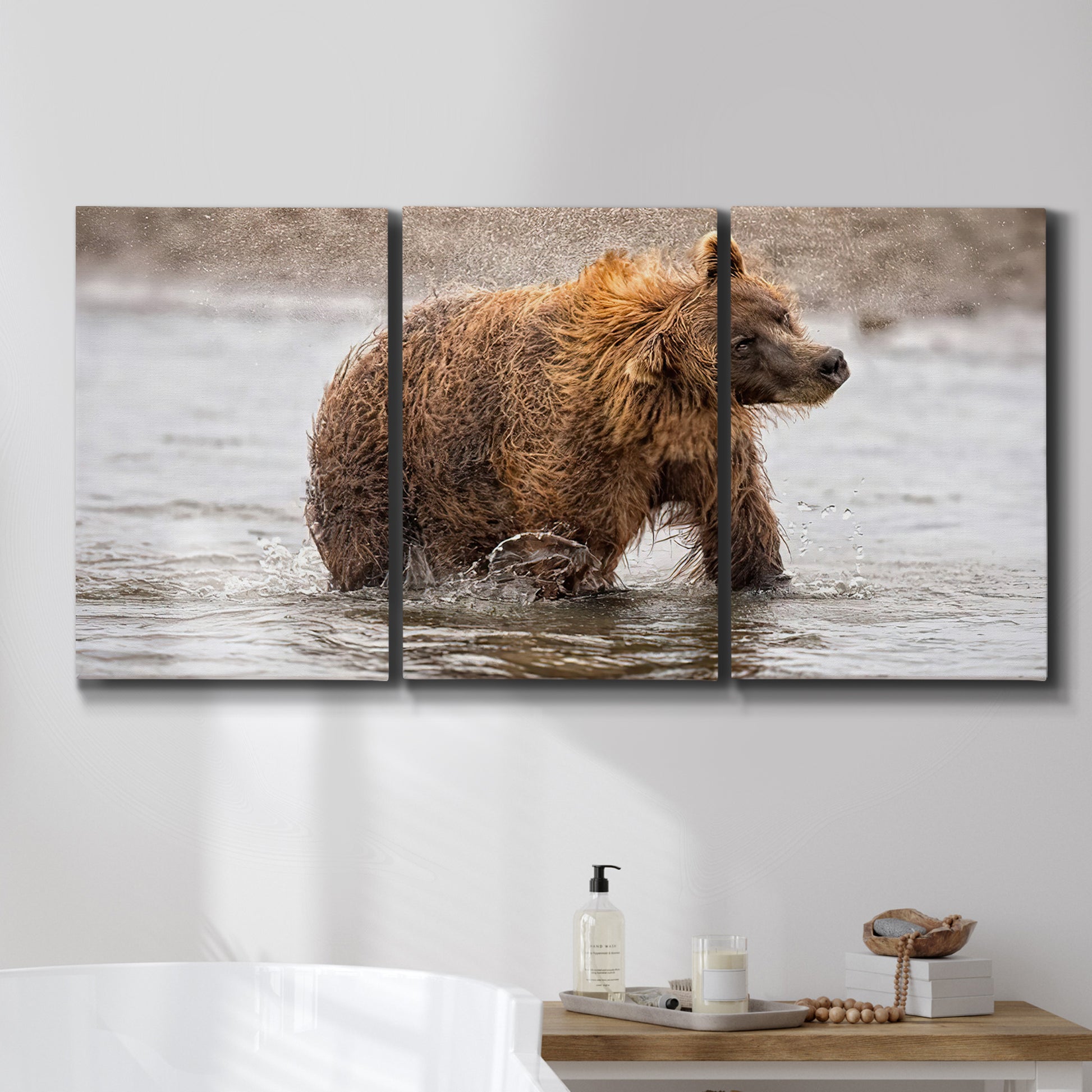 Three-panel canvas wall art featuring wildlife photography animal portrait, displayed in a bathroom above a bathtub.