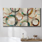 Three-panel canvas wall art featuring geometric circular abstract design, displayed in a bathroom above a bathtub.