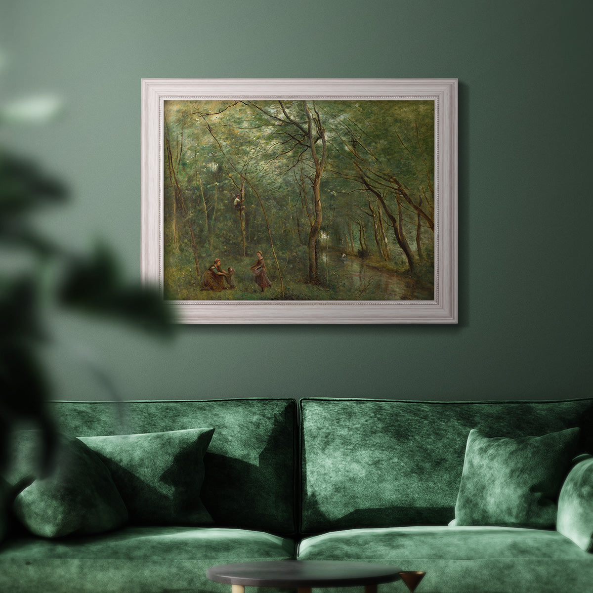 Traditional rural landscape scene with figures by Jean-Baptiste-Camille Corot in an ornate weathered white frame displayed in a dark-toned interior setting.