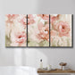 Three-panel canvas wall art featuring spring floral blossoms in bloom, displayed in a bathroom above a bathtub.