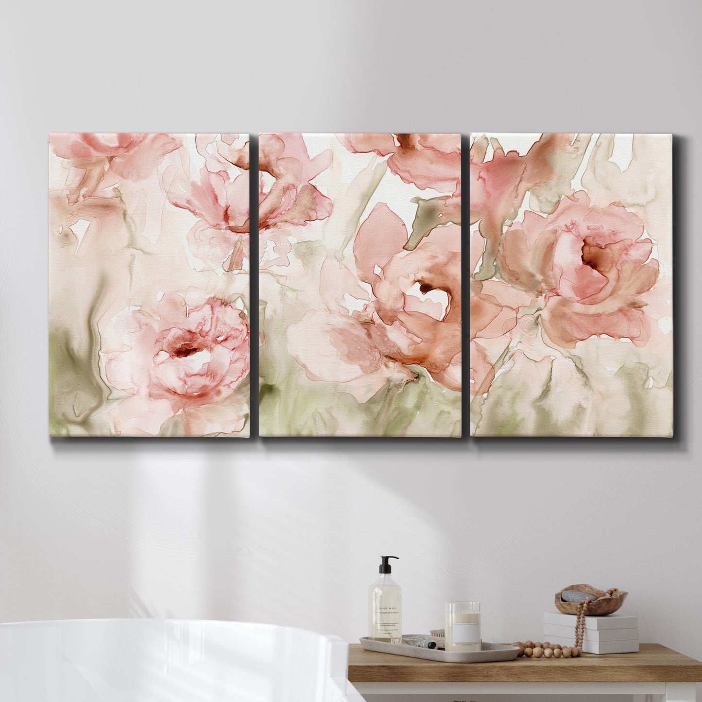Three-panel canvas wall art featuring spring floral blossoms in bloom, displayed in a bathroom above a bathtub.