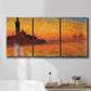 Three-panel canvas wall art featuring Venetian church at sunset, displayed in a bathroom above a bathtub.