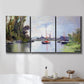 Three-panel canvas wall art featuring river view with boats and reflections, displayed in a bathroom above a bathtub.