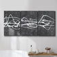 Three-panel canvas wall art featuring minimal abstract frequency lines, displayed in a bathroom above a bathtub.