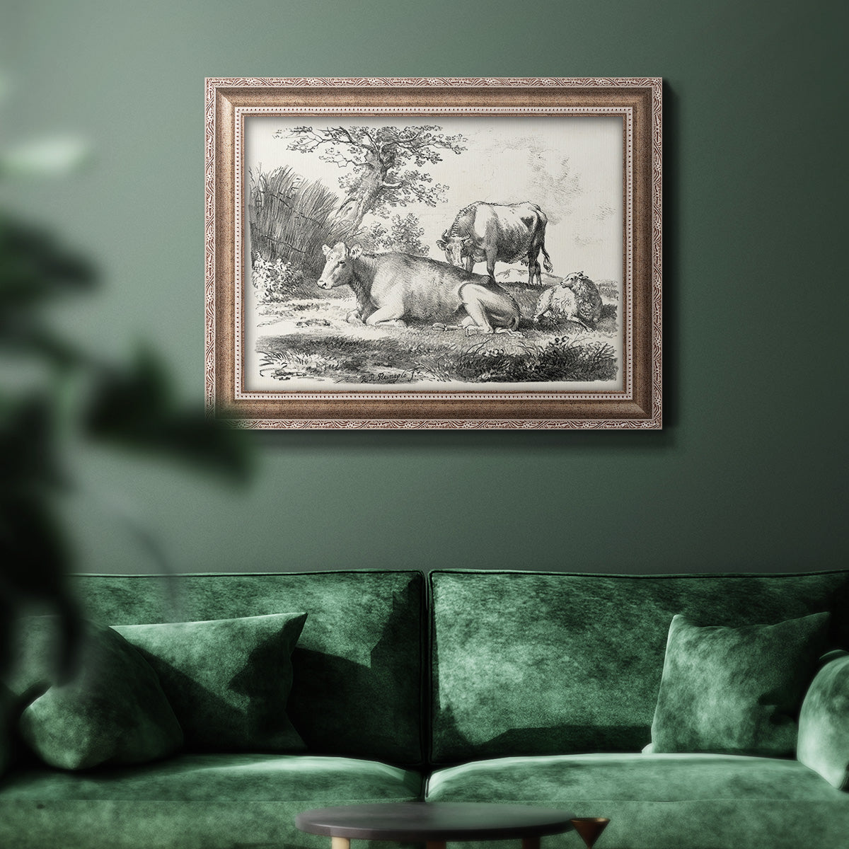 Classical pastoral landscape artwork by Nicolas Berchem in an ornate traditional silver frame displayed in a dark-toned interior setting.
