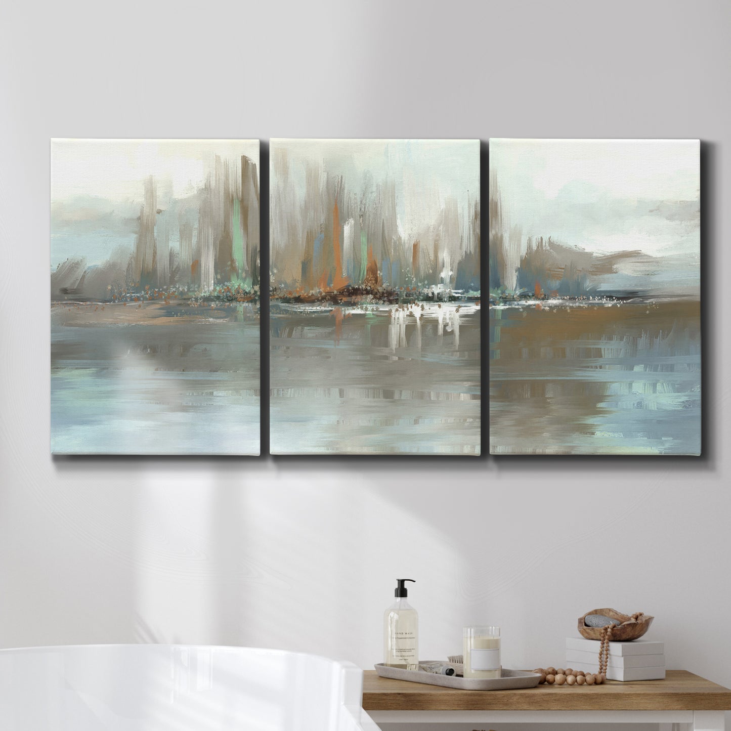 Three-panel canvas wall art featuring glowing abstract city lights, displayed in a bathroom above a bathtub.