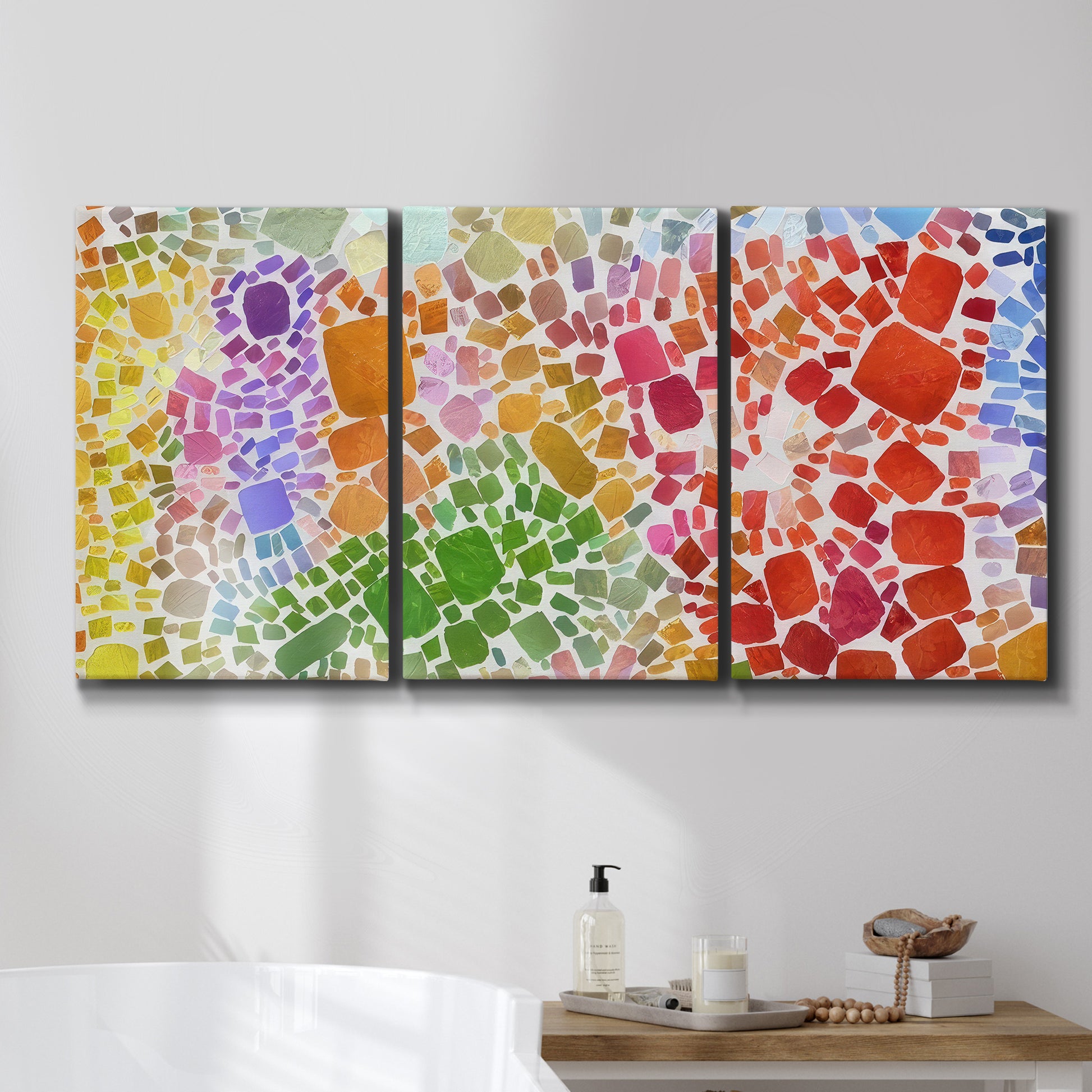 Three-panel canvas wall art featuring peaceful tropical inspired landscape, displayed in a bathroom above a bathtub.