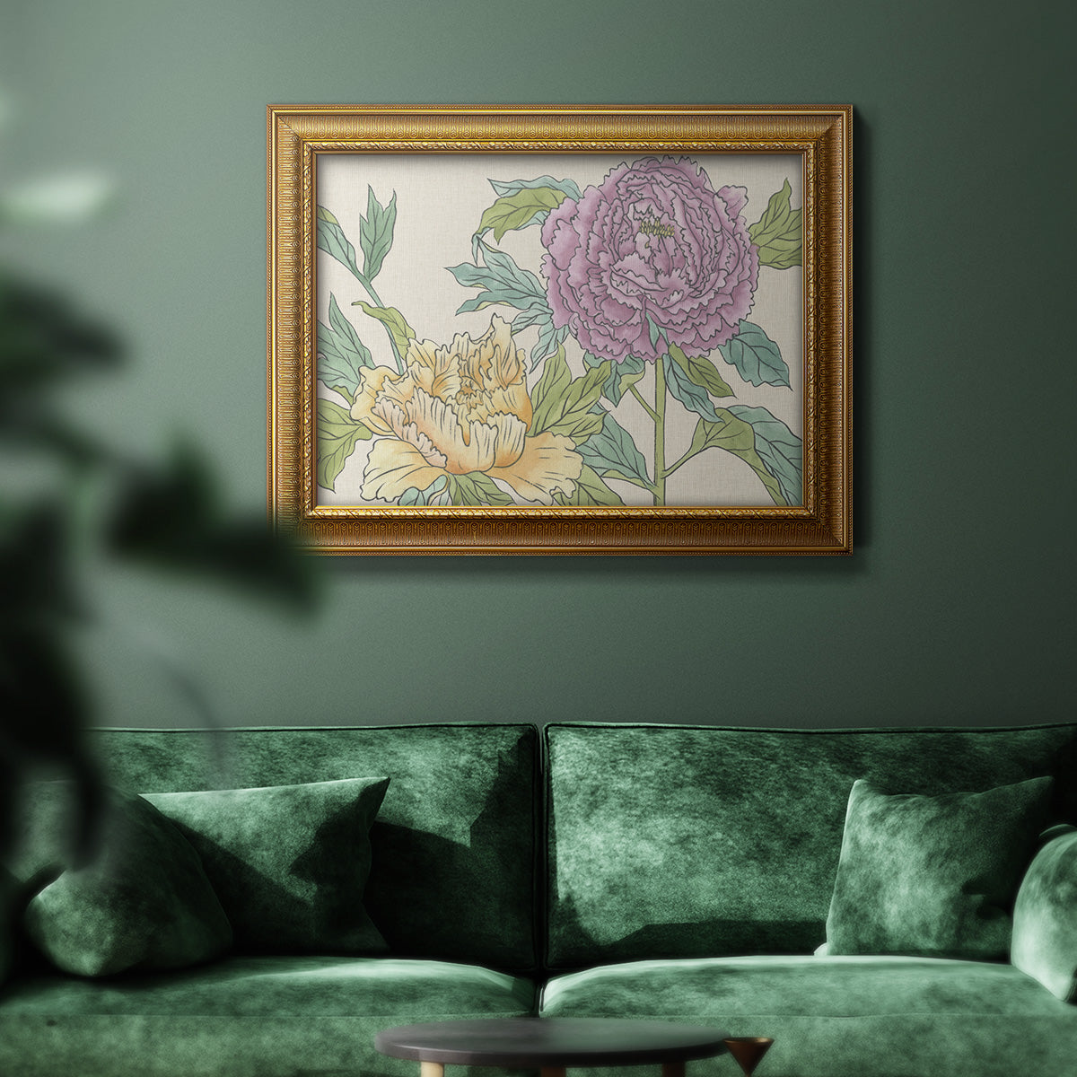 Contemporary peony flower illustration in an ornate traditional gold frame displayed in a dark-toned interior setting.