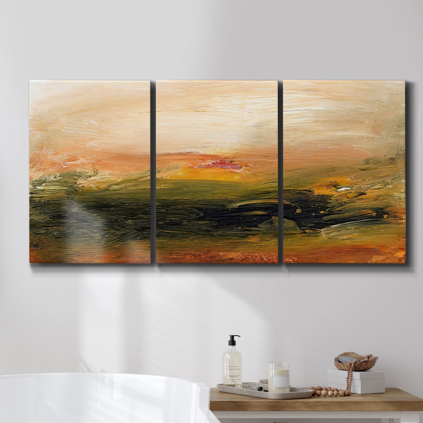 Three-panel canvas wall art featuring soft abstract evening light, displayed in a bathroom above a bathtub.