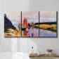 Three-panel canvas wall art featuring stone breakwater at low tide, displayed in a bathroom above a bathtub.