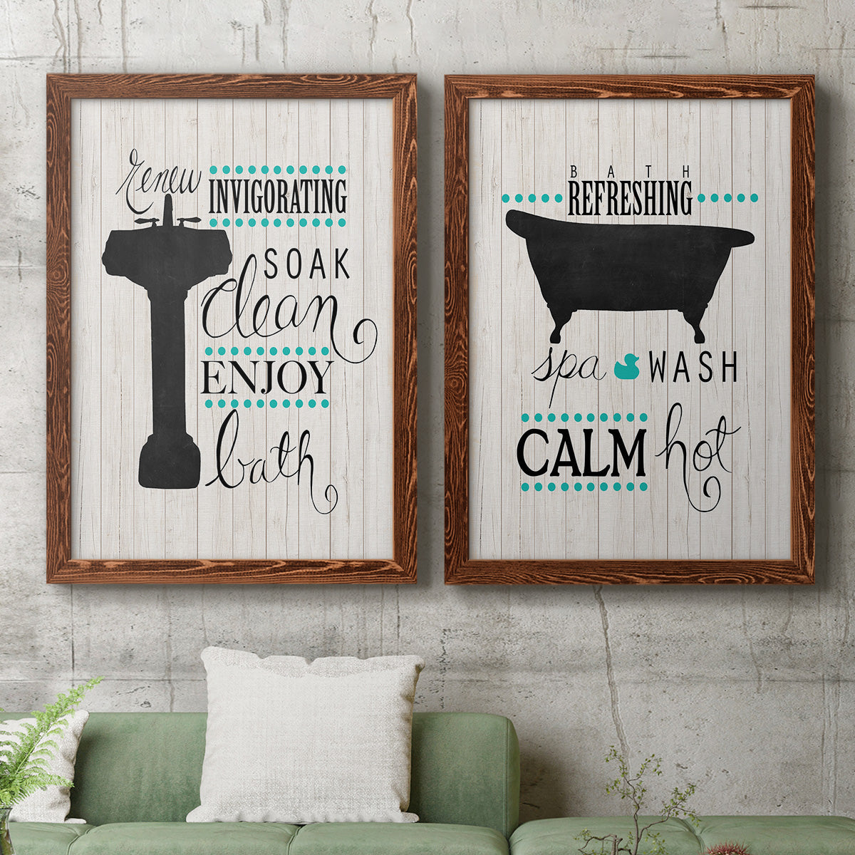 Set of two maple barnwood framed canvas prints depicting a coordinated art pair of playful bathtub silhouettes and bath-themed typography rendered as graphic bathroom word art above a sofa in a modern living room.