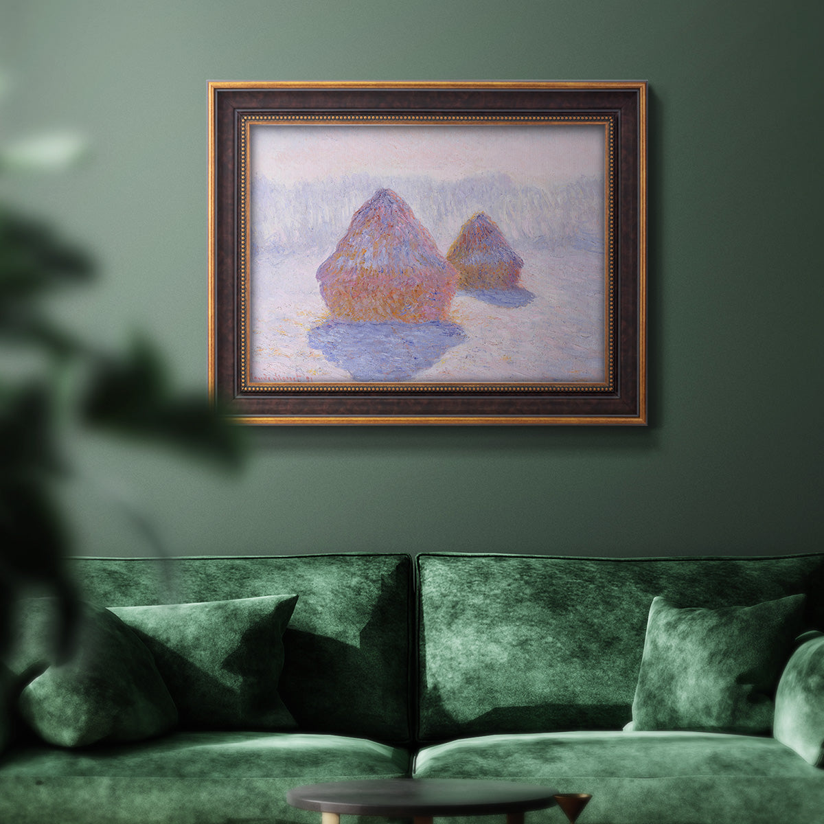 Impressionist winter haystack scene with sunlight by Claude Monet in an ornate bronzed mahogany wood frame displayed in a dark-toned interior setting.