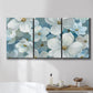 Three-panel canvas wall art featuring soft white floral abstraction, displayed in a bathroom above a bathtub.
