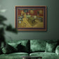 Impressionist interior of a night café by Vincent van Gogh in an ornate bronzed mahogany wood frame displayed in a dark-toned interior setting.