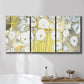 Three-panel canvas wall art featuring vintage inspired floral abstraction, displayed in a bathroom above a bathtub.