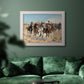 Impressionist western action scene by Frederic Remington in an ornate weathered white frame displayed in a dark-toned interior setting.