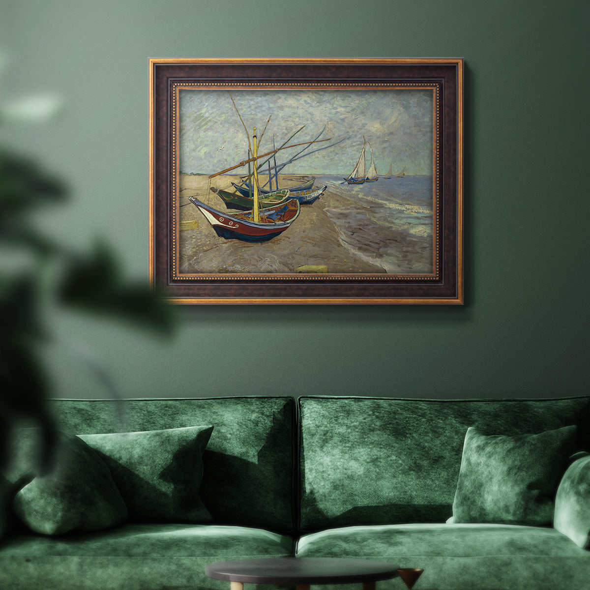 Impressionist coastal fishing boats scene by Vincent van Gogh in an ornate bronzed mahogany wood frame displayed in a dark-toned interior setting.