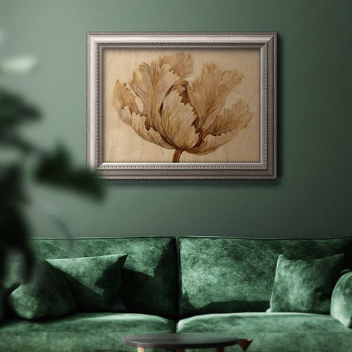Minimalist sepia tulip botanical artwork in an ornate vintage silver frame displayed in a dark-toned interior setting.