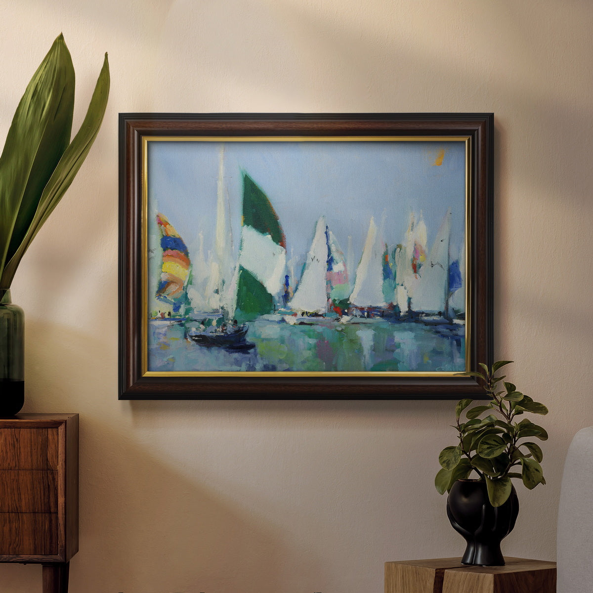 Coastal harbor watercolor painting in an ornate mahogany wood frame with gold liner displayed in a dark-toned interior setting.