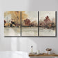 Three-panel canvas wall art featuring autumn landscape with trees and field, displayed in a bathroom above a bathtub.