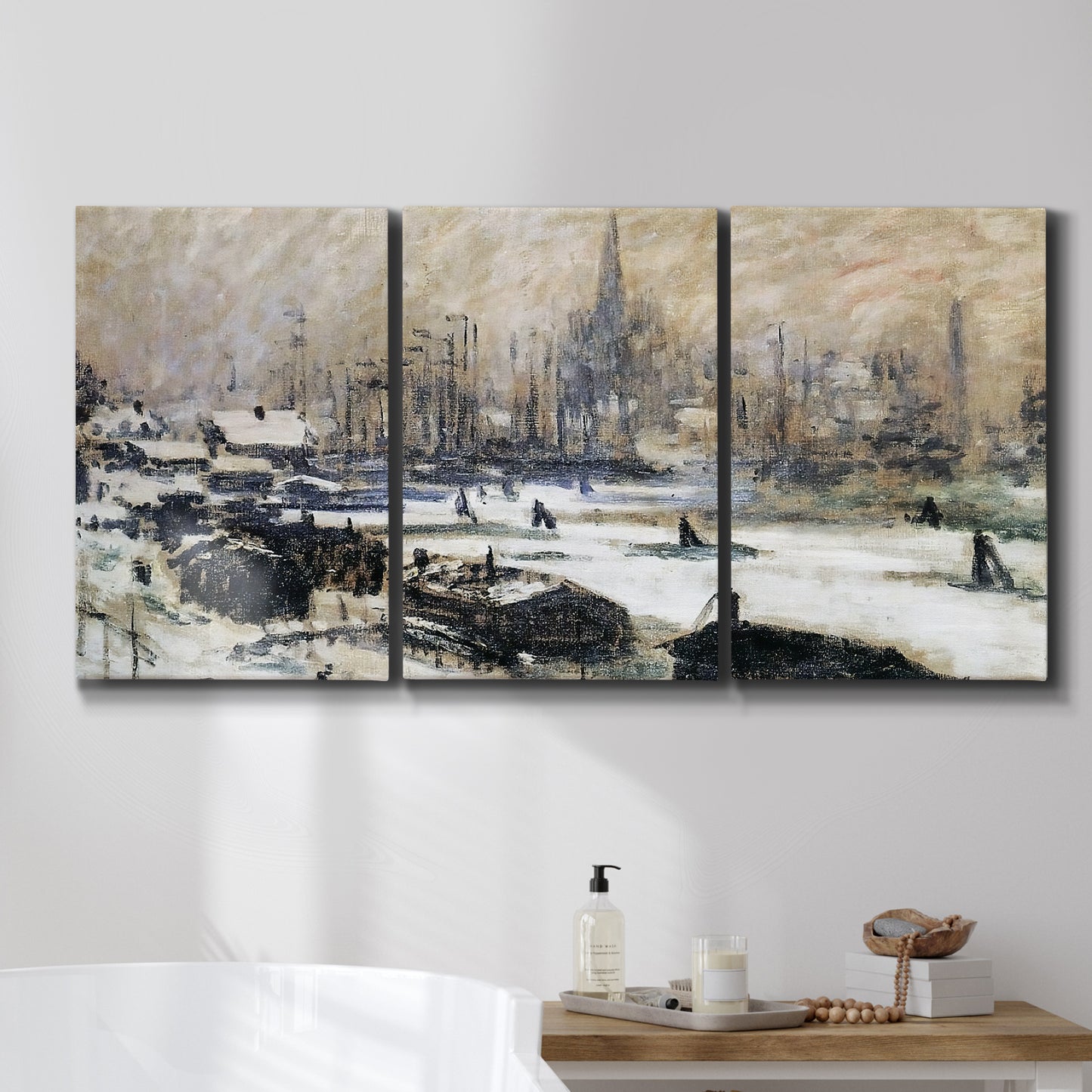 Three-panel canvas wall art featuring snowy village road in winter, displayed in a bathroom above a bathtub.