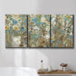 Three-panel canvas wall art featuring abstract flowering vine pattern, displayed in a bathroom above a bathtub.
