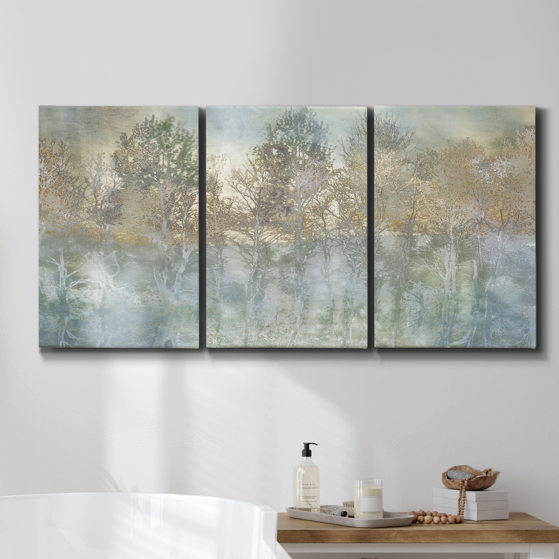 Three-panel canvas wall art featuring abstract river reflections, displayed in a bathroom above a bathtub.