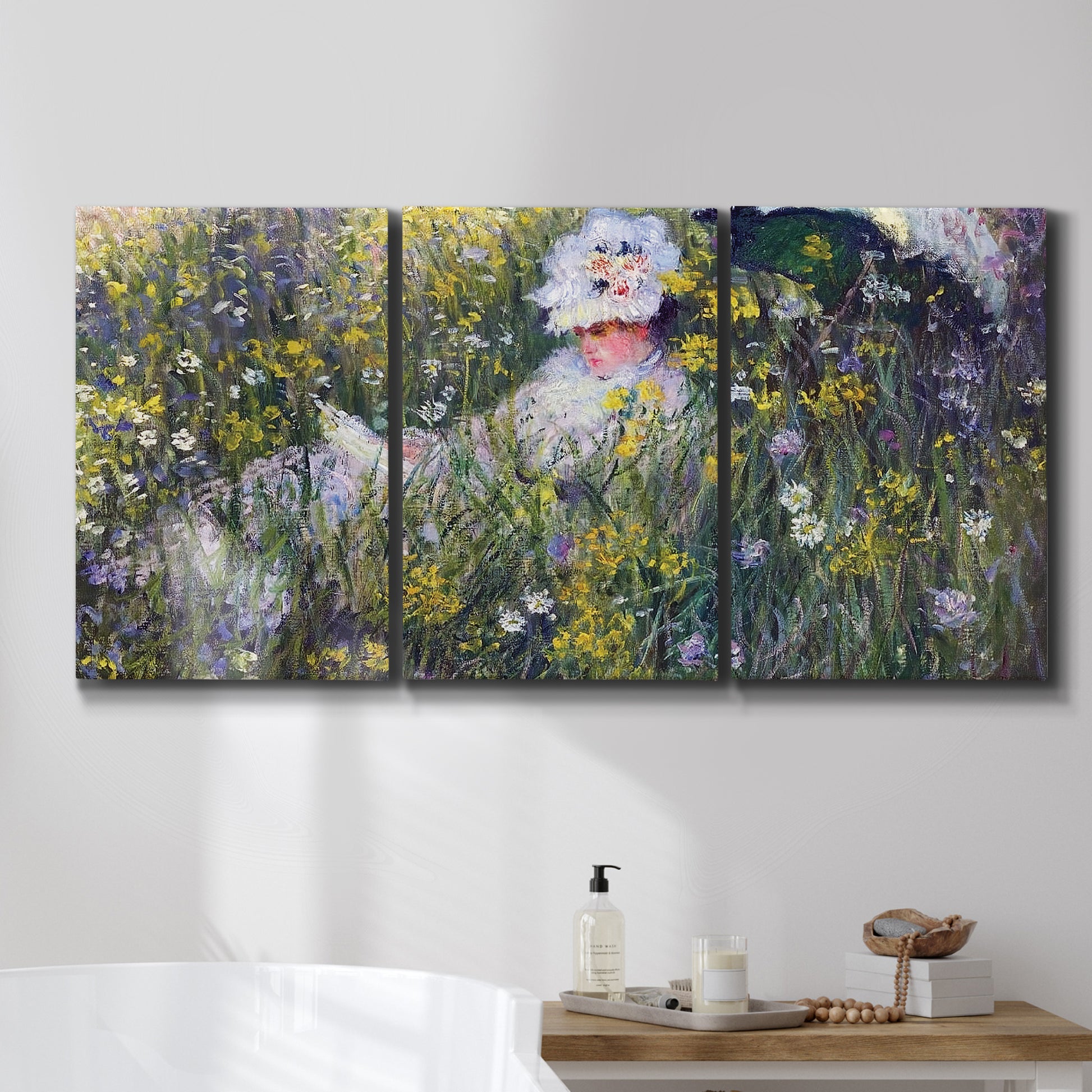 Three-panel canvas wall art featuring woman walking with parasol, displayed in a bathroom above a bathtub.