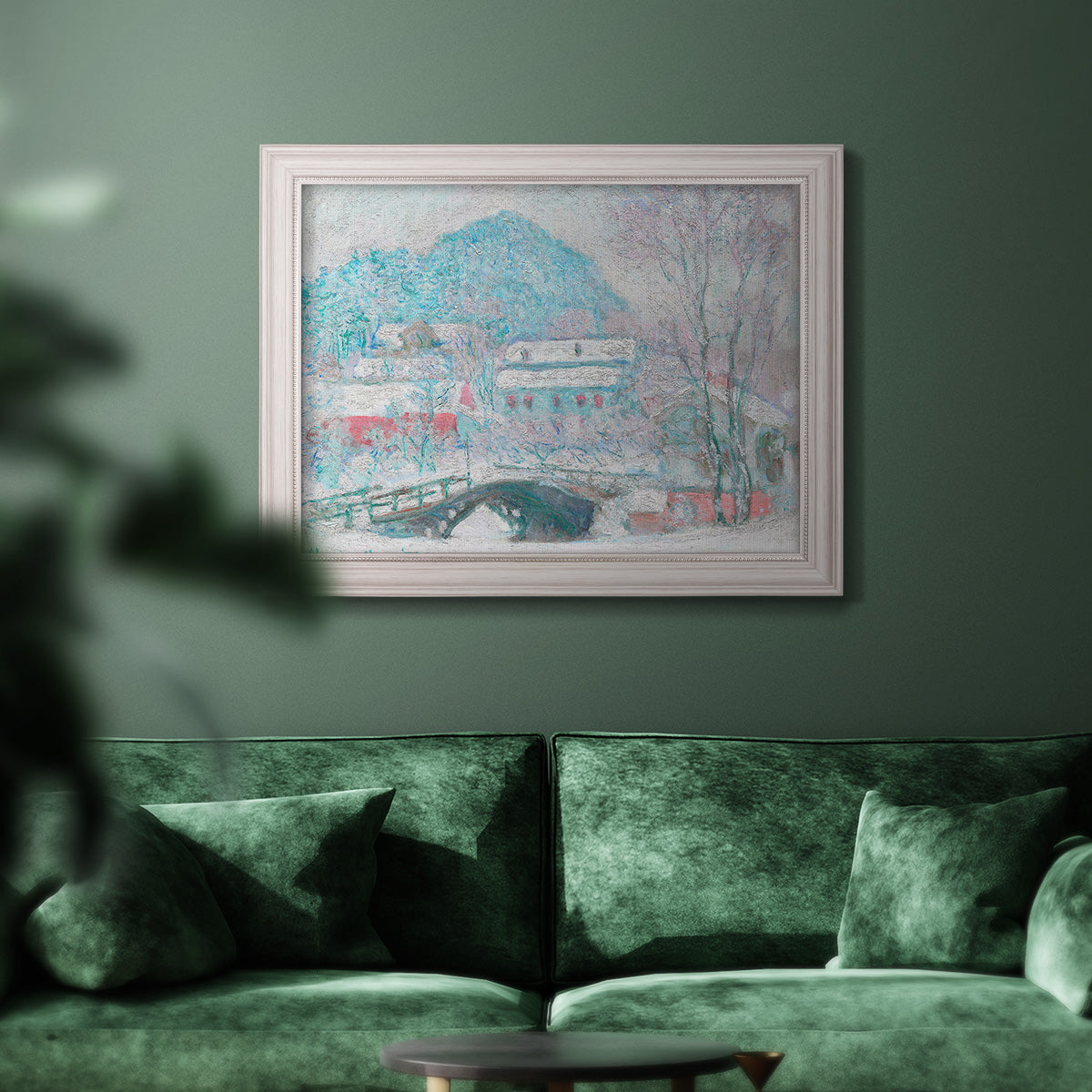 Impressionist coastal village landscape in Norway by Claude Monet in an ornate weathered white frame displayed in a dark-toned interior setting.