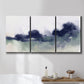 Three-panel canvas wall art featuring misty abstract lake watercolor, displayed in a bathroom above a bathtub.