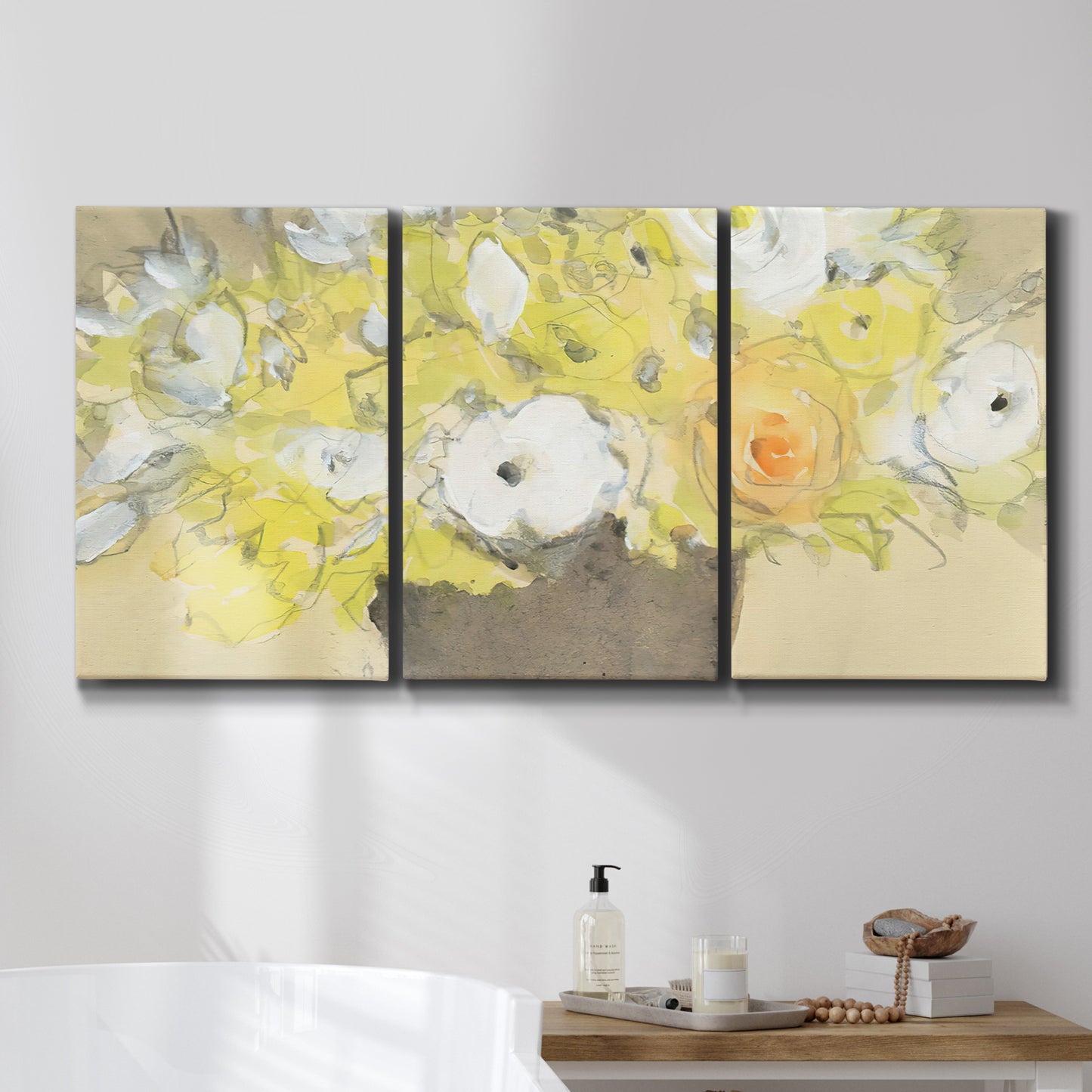 Three-panel canvas wall art featuring abstract floral table arrangement, displayed in a bathroom above a bathtub.