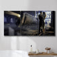 Three-panel canvas wall art featuring couple kissing at train station, displayed in a bathroom above a bathtub.