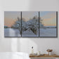 Three-panel canvas wall art featuring animals among snowy woodland trees, displayed in a bathroom above a bathtub.