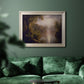 Luminous romantic landscape painting by Frederic Edwin Church in an ornate champagne frame displayed in a dark-toned interior setting.