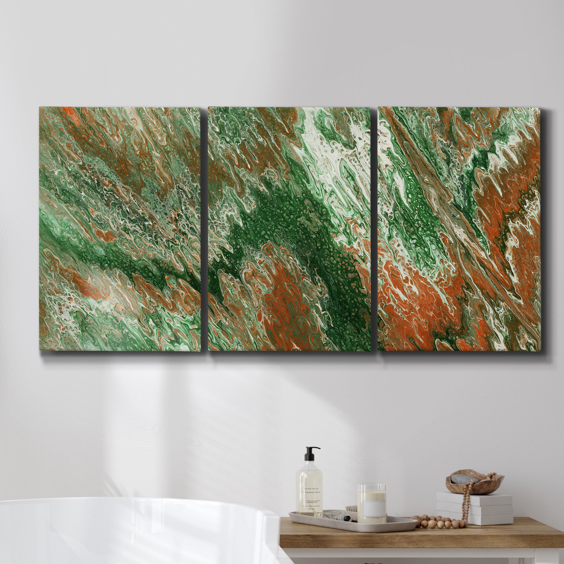 Three-panel canvas wall art featuring modern abstract layered pattern, displayed in a bathroom above a bathtub.