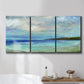 Three-panel canvas wall art featuring narrow island inlet waters, displayed in a bathroom above a bathtub.