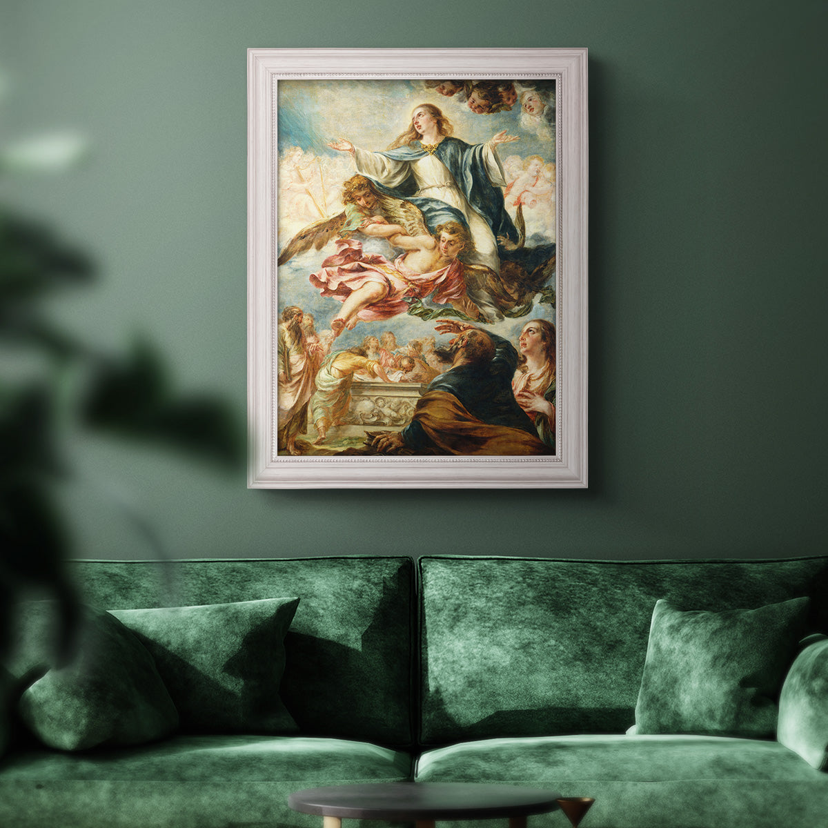 Religious painting of the Assumption of the Virgin Mary by Juan de Valdés Leal in an ornate weathered white frame displayed in a dark-toned interior setting.