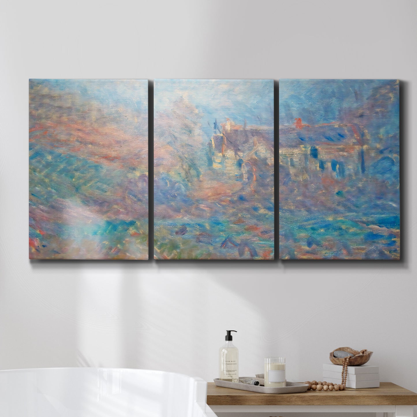 Three-panel canvas wall art featuring sunlit valley landscape, displayed in a bathroom above a bathtub.