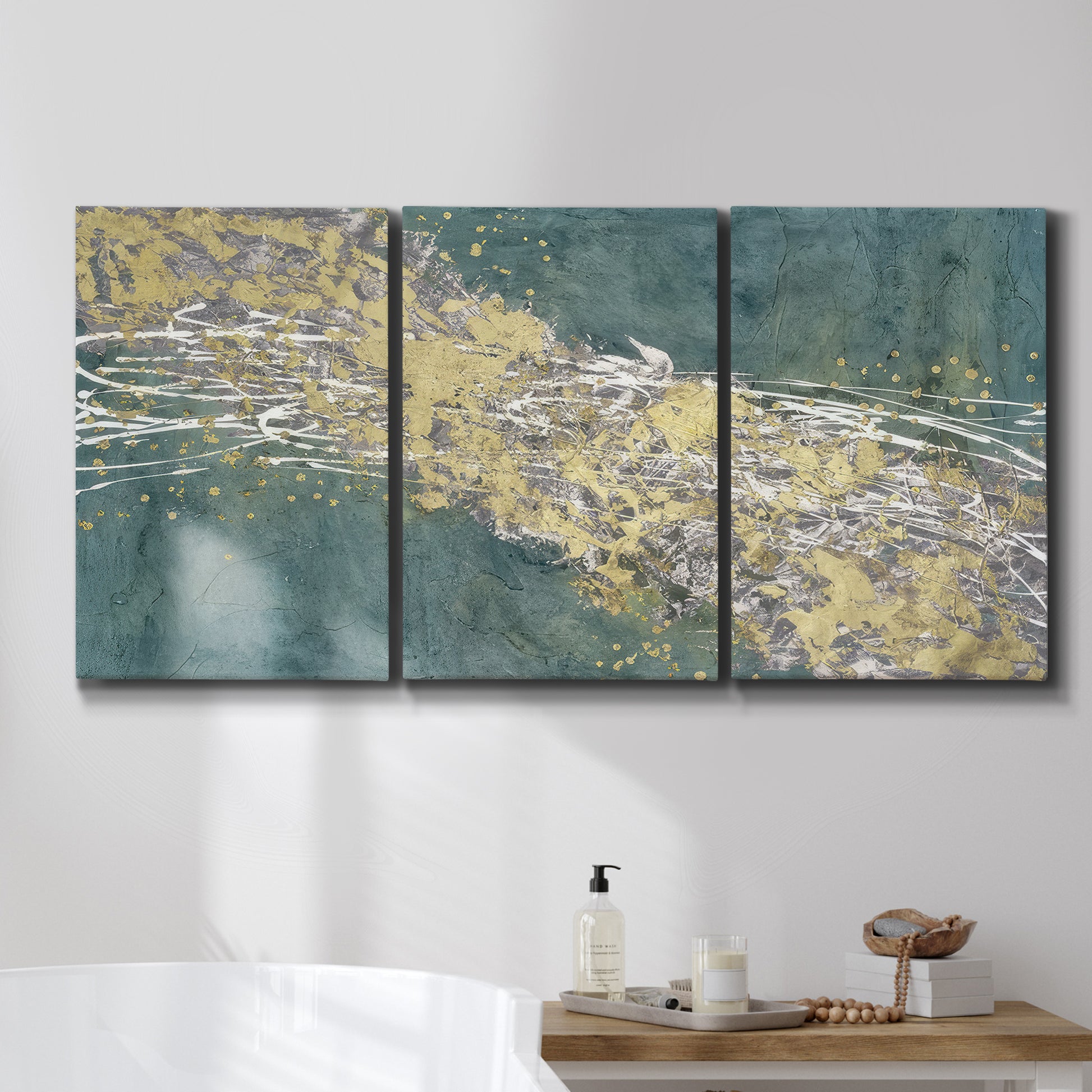 Three-panel canvas wall art featuring soft abstract wind movement, displayed in a bathroom above a bathtub.