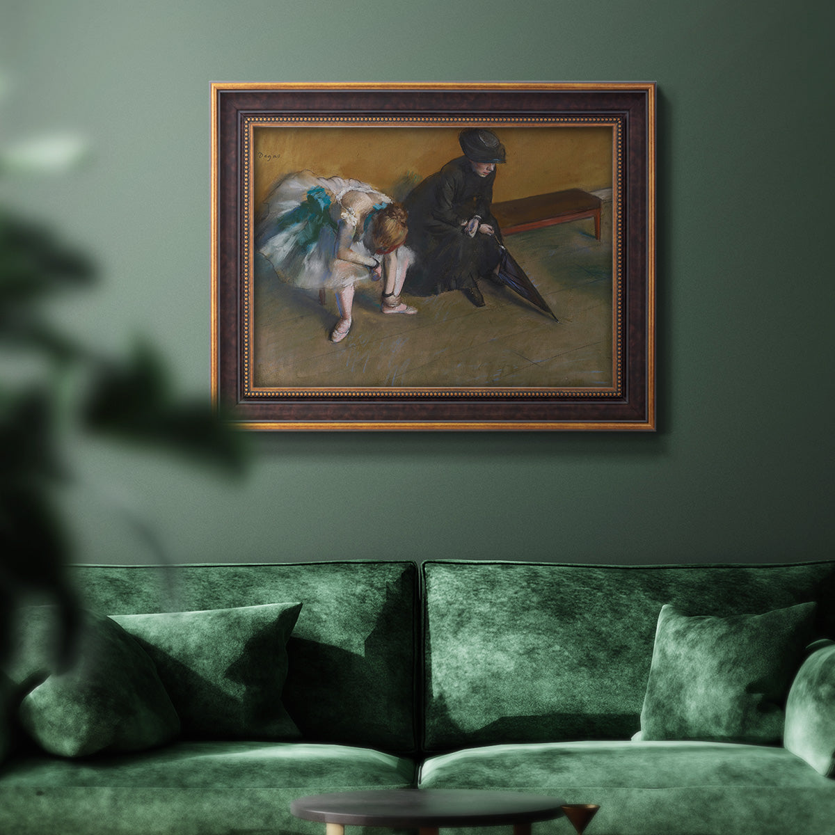Impressionist portrait of a seated woman by Edgar Degas in an ornate bronzed mahogany wood frame displayed in a dark-toned interior setting.