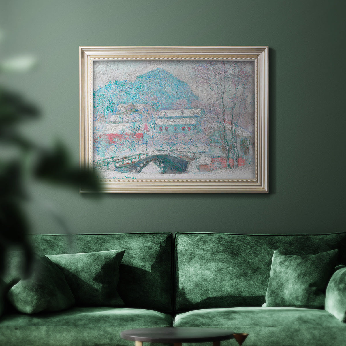 Impressionist coastal village landscape in Norway by Claude Monet in an ornate champagne frame displayed in a dark-toned interior setting.