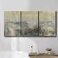 Three-panel canvas wall art featuring gold toned abstract horizon, displayed in a bathroom above a bathtub.