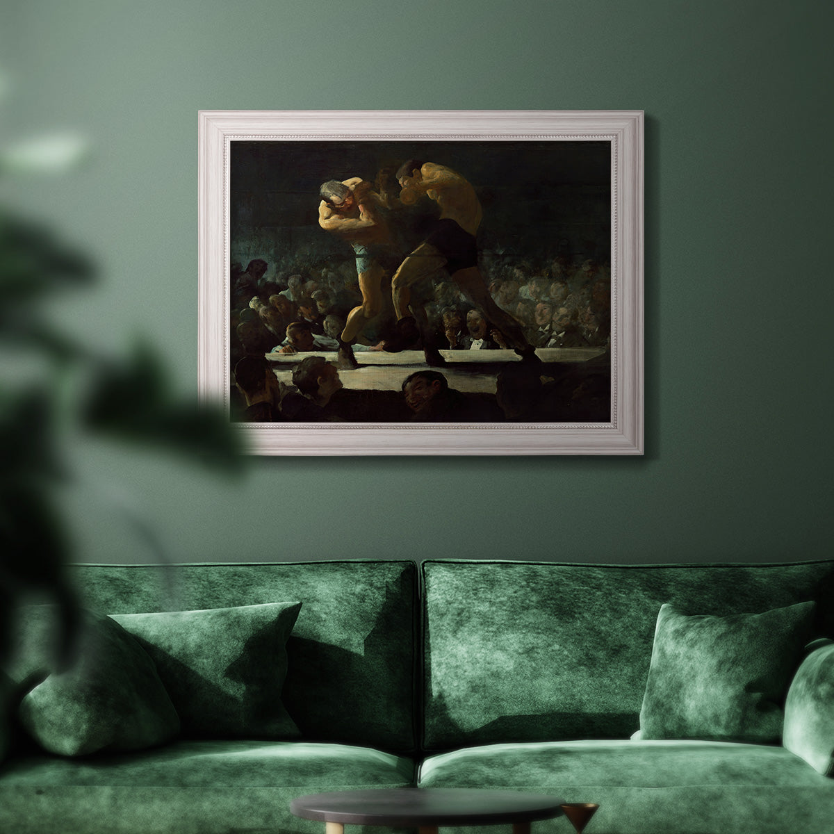 American social club scene painting by George Bellows in an ornate weathered white frame displayed in a dark-toned interior setting.