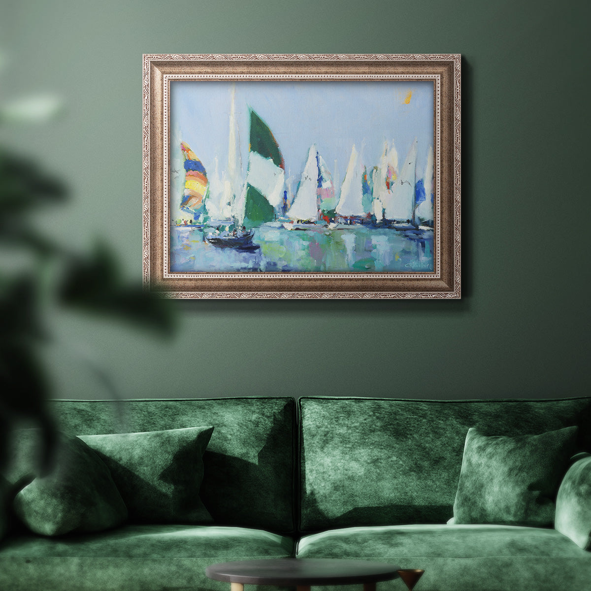 Coastal harbor watercolor painting in an ornate traditional silver frame displayed in a dark-toned interior setting.