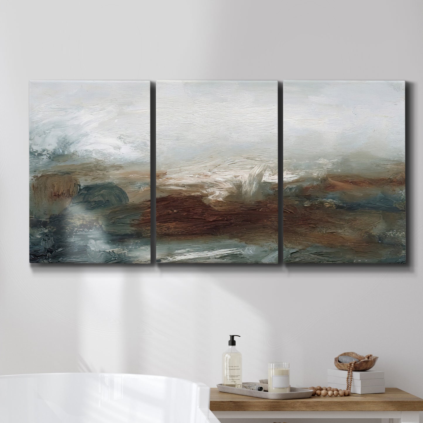 Three-panel canvas wall art featuring soft abstract evening light, displayed in a bathroom above a bathtub.