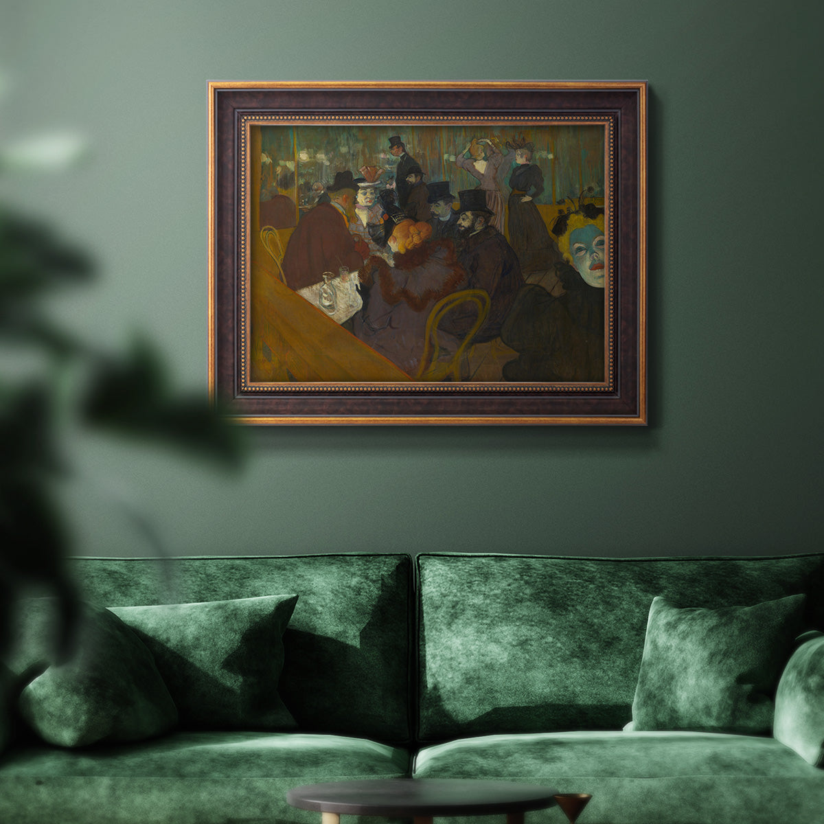 Impressionist cabaret interior scene by Henri de Toulouse-Lautrec in an ornate bronzed mahogany wood frame displayed in a dark-toned interior setting.
