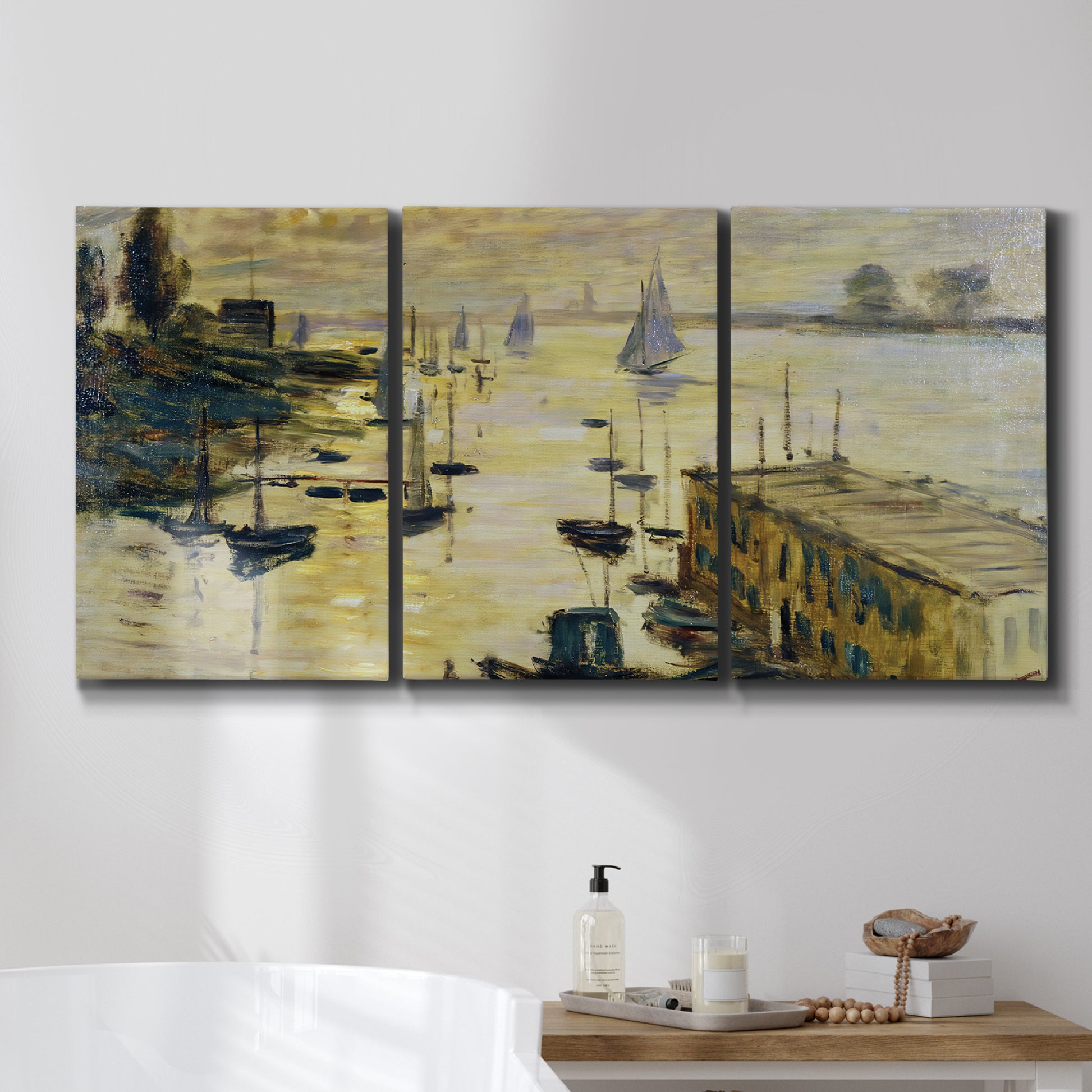 Three-panel canvas wall art featuring working harbor with boats, displayed in a bathroom above a bathtub.