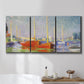 Three-panel canvas wall art featuring red boats along riverbank, displayed in a bathroom above a bathtub.