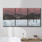 Three-panel canvas wall art featuring winter sunset snowfall landscape, displayed in a bathroom above a bathtub.